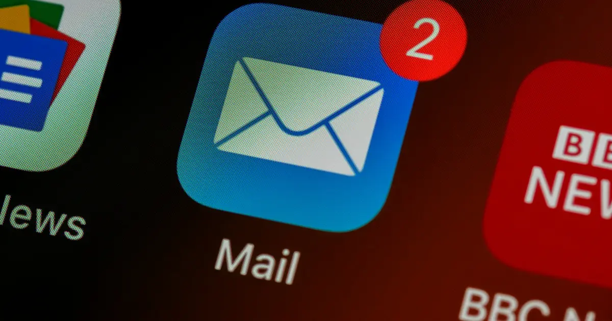 A smartphone home screen showing a mail app icon with two unread notifications.